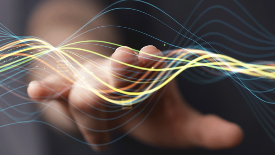 hand touching digital wave