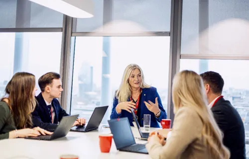 Group of partners meeting in conference room
