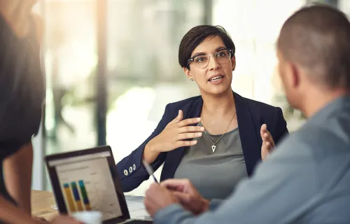 business consultant discussing digital leader insights with client