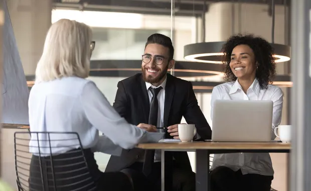 Three business consultants meeting